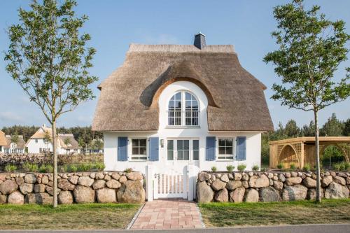 Фотография гостевого дома Ferienhaus Schilfrohrsaenger 43