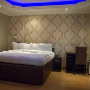 Фотографии гостиницы
Triple Tee Hotel