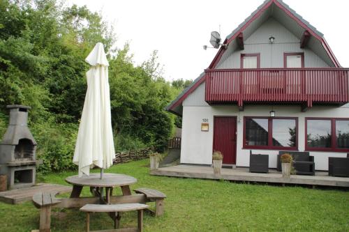 Фотография гостевого дома FH "Gestiefelter Kater" am See im hessischen Bergland