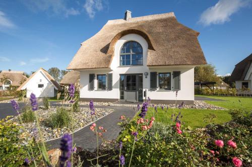 Фотография гостевого дома Ferienhaus Schilfrohrsaenger 36