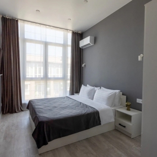 Фотография квартиры Апартаменты Red Apartments Арт Лайт Сити Леонардо