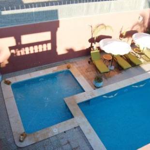 Фотографии гостевого дома 
            Riad les jardins Mabrouk