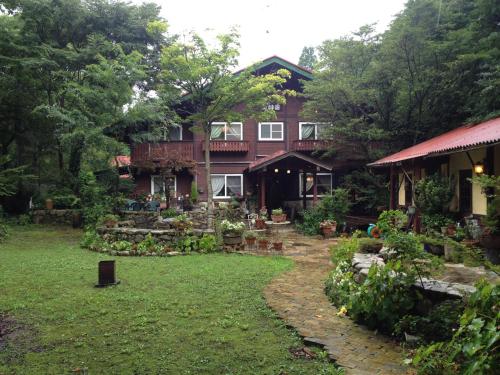 Фотография гостевого дома Sanrinsha