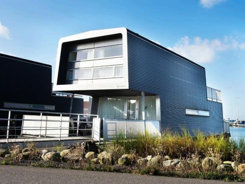 Фотография гостевого дома Three-Bedroom Holiday home in Hemmet 65