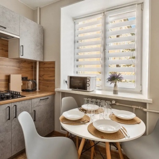 Фотография квартиры FullHouseApart двухкомнатные апартаменты с балконом и детской кроваткой