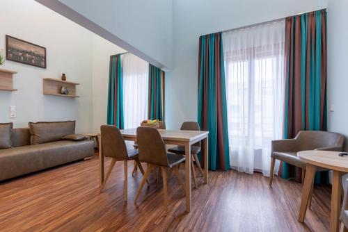 Фотография гостиницы Trip Inn Living & Suites