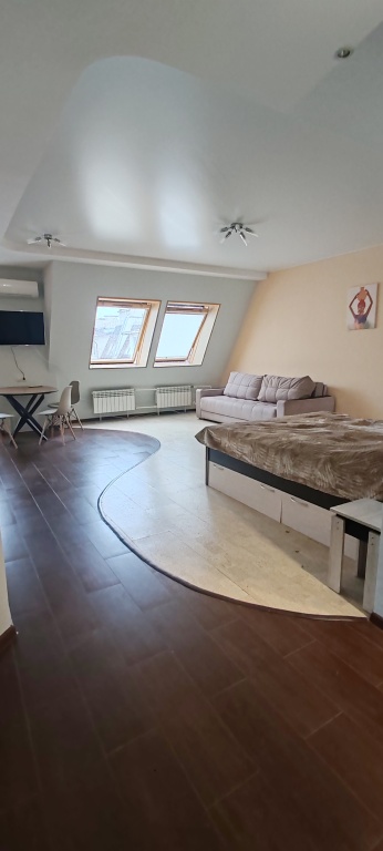 Фотография квартиры Квартира - студия в центре, есть выход на крышу и бесплатная парковка