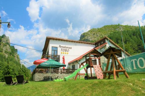 Фотография гостевого дома Pensiunea Tobo