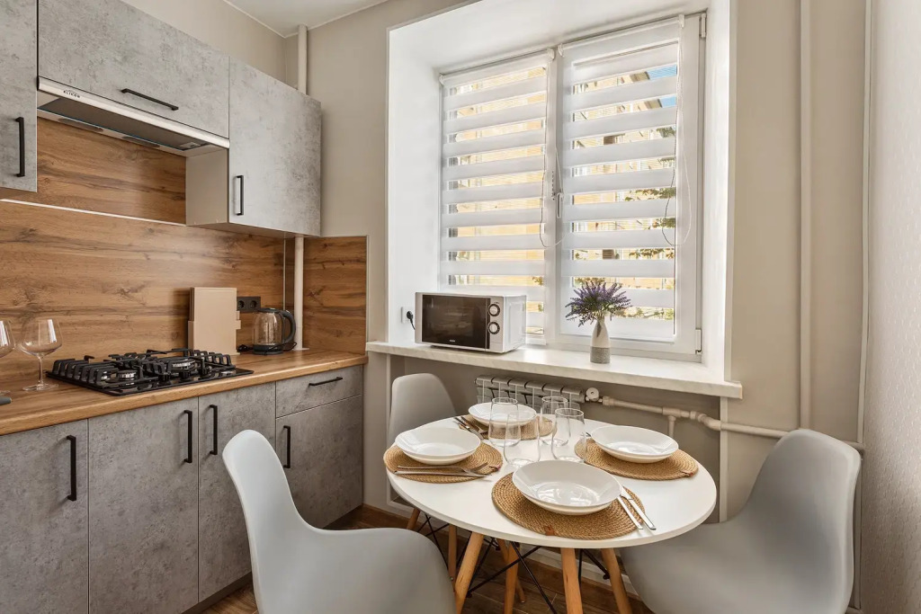 Фотография квартиры FullHouseApart двухкомнатные апартаменты с балконом и детской кроваткой