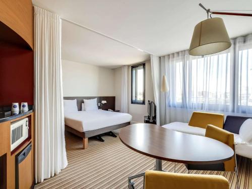 Фотография гостиницы Novotel Suites Paris Nord 18ème