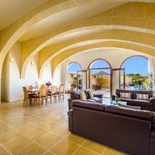 Фотографии гостевого дома 
            Four Winds Holiday Home