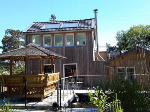 Фотография гостевого дома Spacious Chalet in Jalhay with Jacuzzi