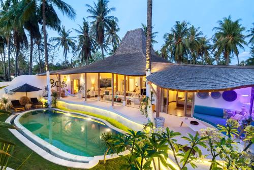 Фотография базы отдыха De'Coco Villa and Suites