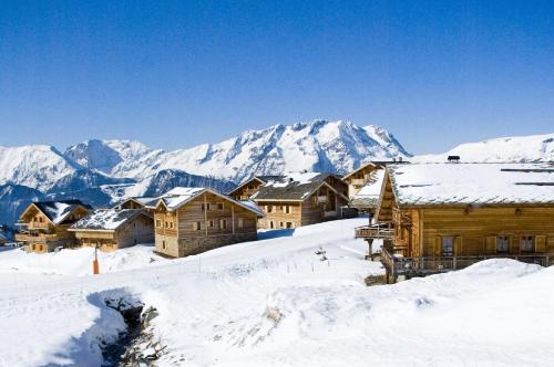 Фотография гостевого дома Madame Vacances Les Chalets de l'Altiport
