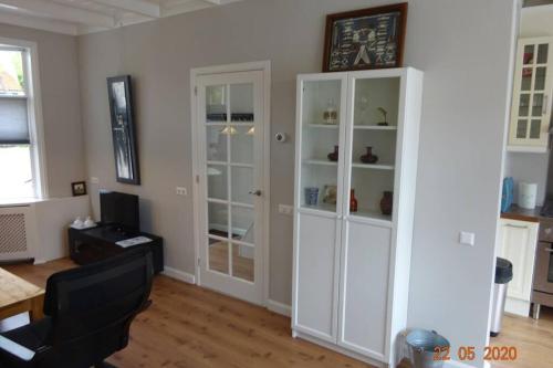 Фотография гостевого дома Stadswoning voor jonge gezinnen en senioren