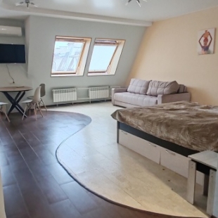 Фотография квартиры Квартира - студия в центре, есть выход на крышу и бесплатная парковка