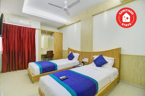 Фотография гостиницы Capital O 47444 Grand Gunas