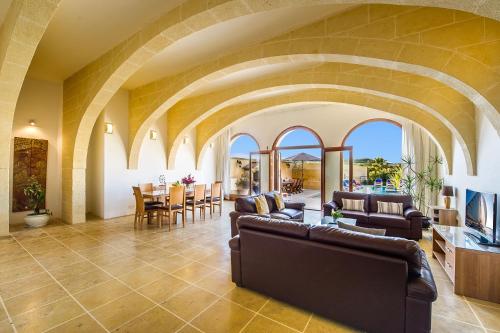 Фотография гостевого дома Four Winds Holiday Home