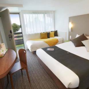 Фотографии гостиницы 
            Campanile Le Mans - Arnage