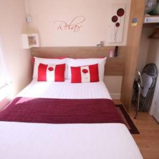 Фотографии гостевого дома
The Railway Sleeper Lodge