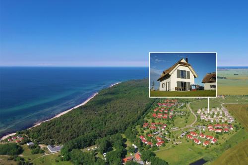 Фотография гостевого дома Reetdachhäuser am Bakenberg