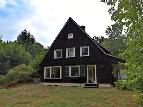 Фотография гостевого дома Large holiday home in Braunlage on the edge of the forest with 2 terraces and wood stove