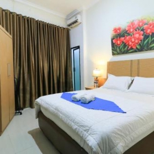 Фотография гостевого дома Labuana Homestay & Cafe Garden