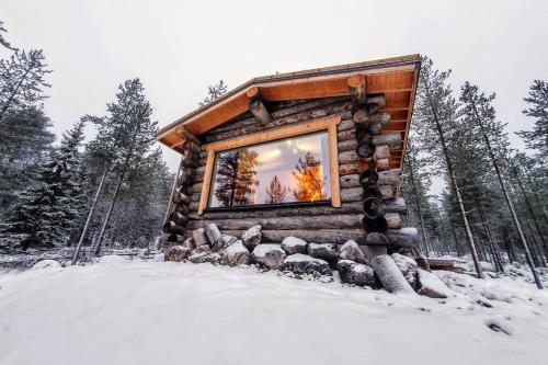 Фотография гостевого дома Log cabin in Lapland by the river