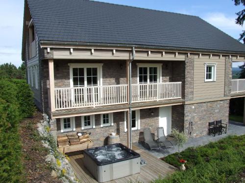 Фотография гостевого дома Beautiful Chalet with Jacuzzi and Sauna in Durbuy