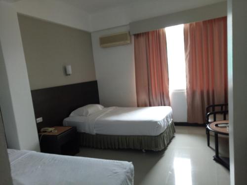 Фотография гостиницы New Cathay Hotel