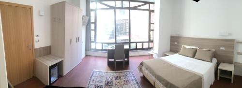 Фотография гостиницы Hotel Le Mura e Residence