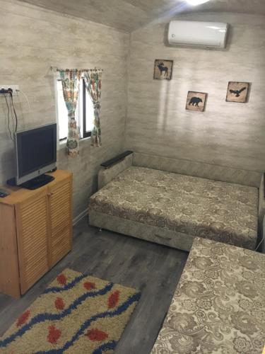 Фотографии гостевого дома
Лесной домик Ель