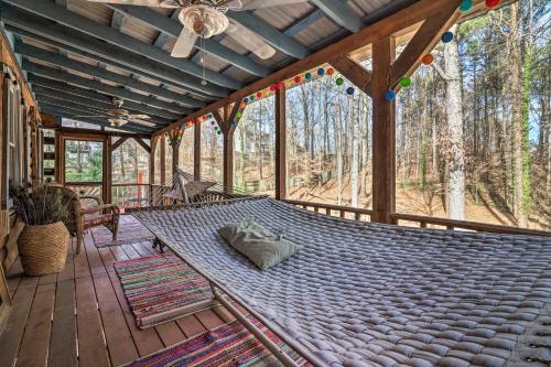 Фотографии гостевого дома 
            Peaceful Log Cabin on 3 Acres - Near Atlanta!