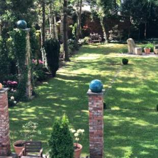 Фотографии гостевого дома 
            Pension Bloo Tomato