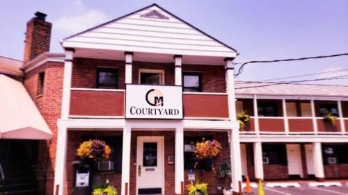 Фотография мотеля Central Motel Courtyard