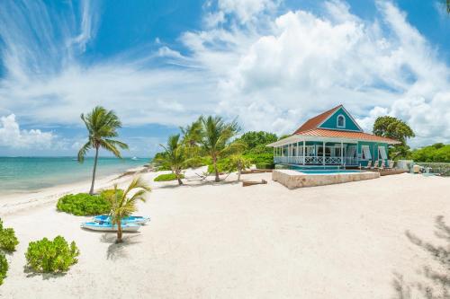Фотографии гостевого дома 
            Lone Palm by Grand Cayman Villas