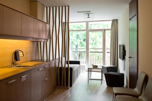 Фотография гостиницы Amberton Green Apartments Palanga