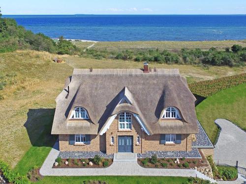 Фотография гостевого дома Strandhaus 7 "Ostsee" F663 mit Meerblick, Sauna, Kamin
