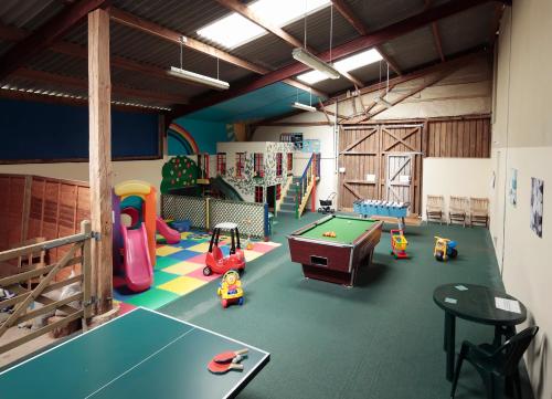 Фотография гостевого дома Long Barn Holiday Cottages