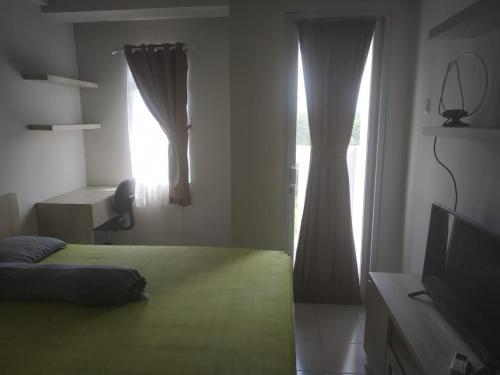 Фотография гостиницы OYO Life 2837 Apartment Dramaga Tower