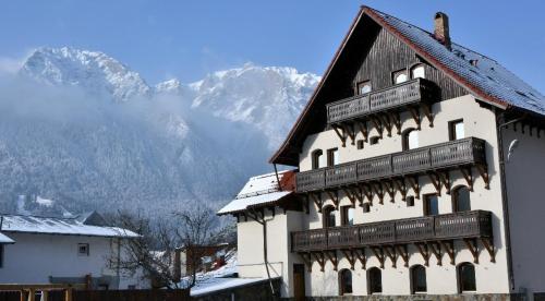 Фотография гостевого дома Pensiunea Manidum