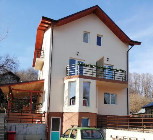 Фотография гостевого дома Pensiunea Casuta cu Trandafiri 2