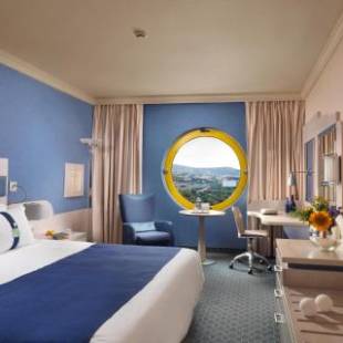 Фотографии гостиницы 
            Holiday Inn Athens Attica Av, Airport W., an IHG Hotel