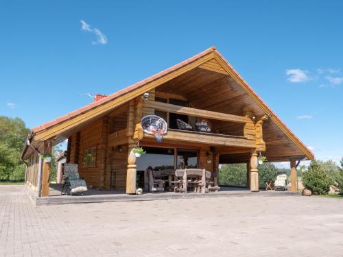 Фотография гостевого дома Privatus rąstinis namas su pirtimi