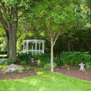 Фотографии мини отеля
Whispering Winds Motel