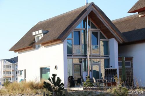 Фотография гостевого дома Ostsee - Reetdachhaus Nr 9 "Emma" im Strand Resort