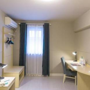 Фотографии гостиницы 
            Jinjiang Inn Shanghai International Tourist Resort Xiuyan Road Subway Station