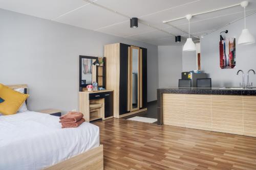 Фотография мини отеля Bangkok Impact Popular Comdominium