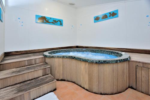 Фотография базы отдыха Auckland Northshore Motels & Holiday Park