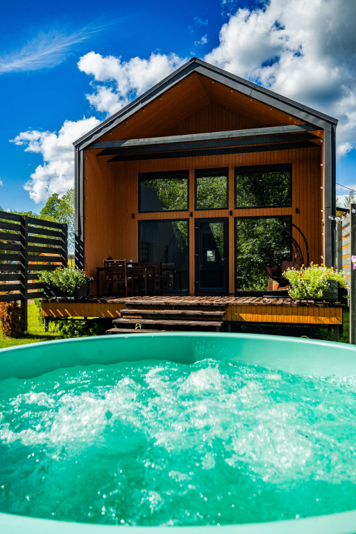 Фотография Коттеджа Частный Дом Барнхаус №1 с дровяной баней и горячей купелью, на 7 госте